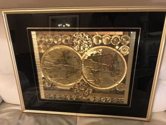 World time clocks in a beautiful golden color with a rare black frame
