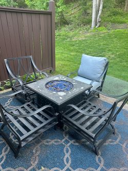 Propane fire Pit and 4 chairs with cushions