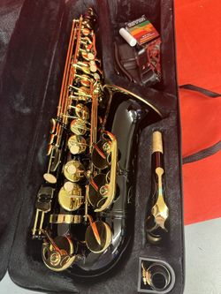 Nice Black and Gold Alto Saxophone with New Box of Reeds $350 Firm