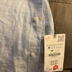 New Zara  T-shirt 15dll. 