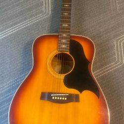 Yamaha FG-336SB acoustic guitar with a sunburst finish.  
