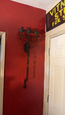 Metal wall candle holder