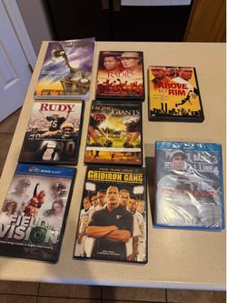 Sports themed DVDs and a book