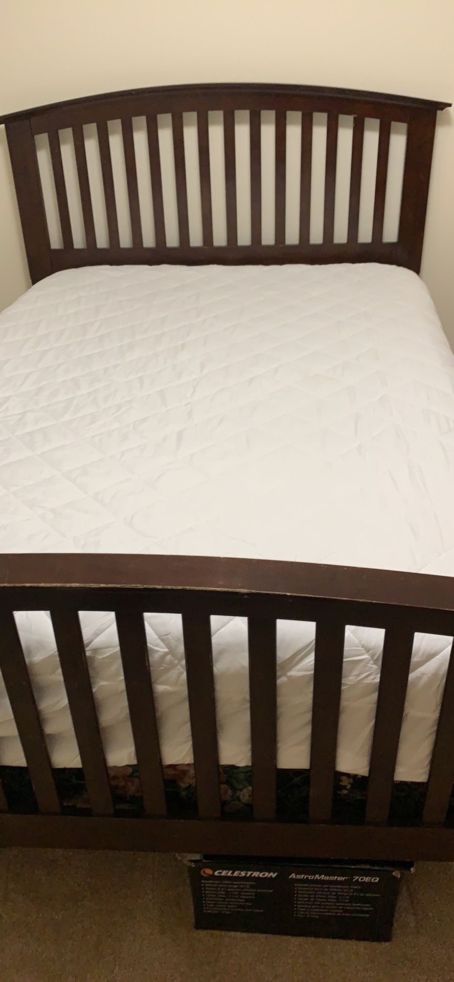 Full size bed with mattress, box spring, bed frame, and new mattress protectors