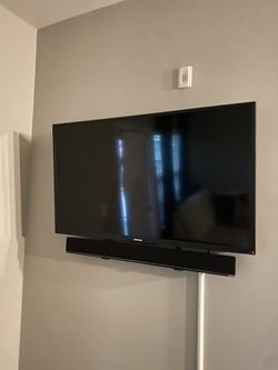 45 Inch Toshiba FIRE TV w/ tilted Mount (sound bar NOT included)