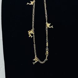 10k gold figaro Dolphin charm anklet, 9" long, weights 3.8 grams