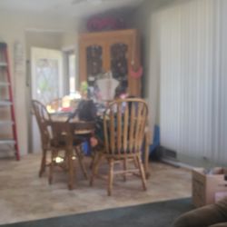 Solid Wood Table And Chairs, One Chair Of The 4 Needs Repair