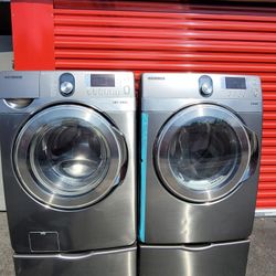 Samsung Front Loading Washer And Stackable Gas Dryer Set With Pedestals 