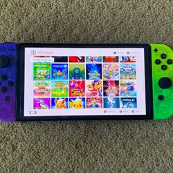 NINTENDO SWITCH OLED with 125 SWITCH GAMES INCLUDED