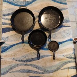 4 Old Different Size Cast Iron Pans