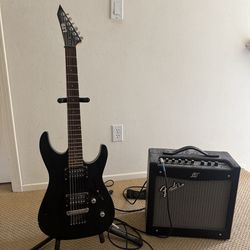 Black Electric Guitar + Fender Mustang Amp Combo