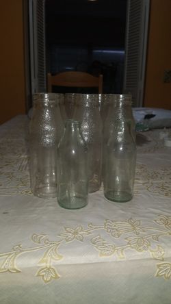 11 glass empty bottles