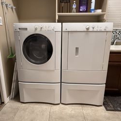 GE front load washed and dryer with pedestals