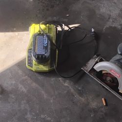 Ryobi battery powered 5 1/2" saw and a 4Ah battery and 30 minute quick charger