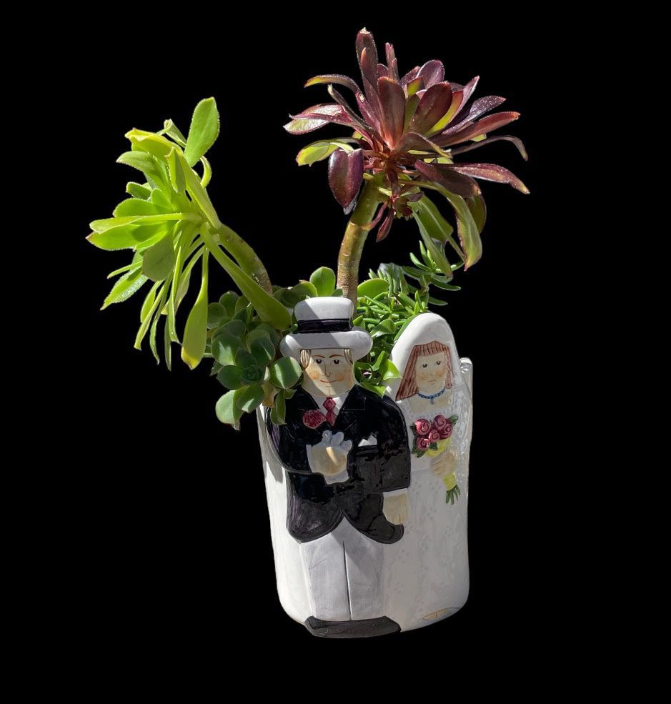 Bride And Groom Filled With Succulents