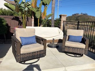 Rattan swivel rockers  powder coated bases