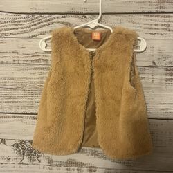 Girls tan colored vest size 4
