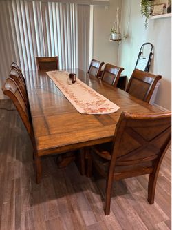 Wood dinning table and 8 chairs