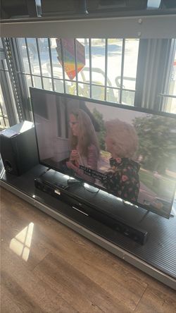 50 inch on tv with sub woofer and sound bar combo