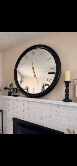Clock, lamp, bar cart, frames, vase