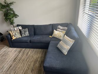 Blue medium sized couch