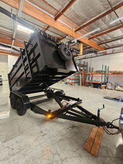NEW DUMP TRAILERS 12x8x4 ROLLING TARP AND SPARE TIRE 2026 YEAR ELECTRIC BRAKES LIGHTS REMOTE CONTROL TITLE IN HAND READY FOR WORK,se habla ESPAÑOL