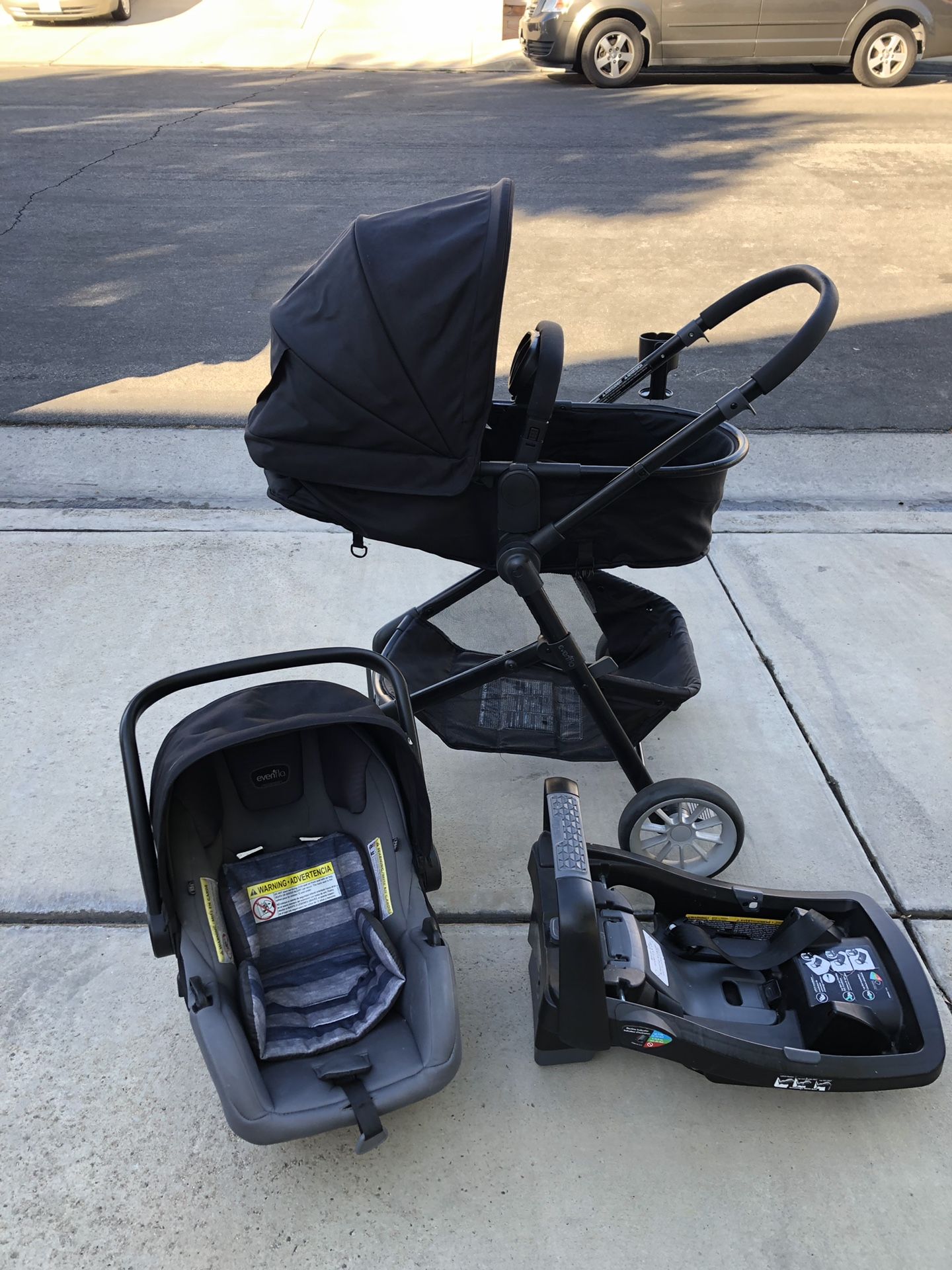 Baby stroller with car seat attached to it