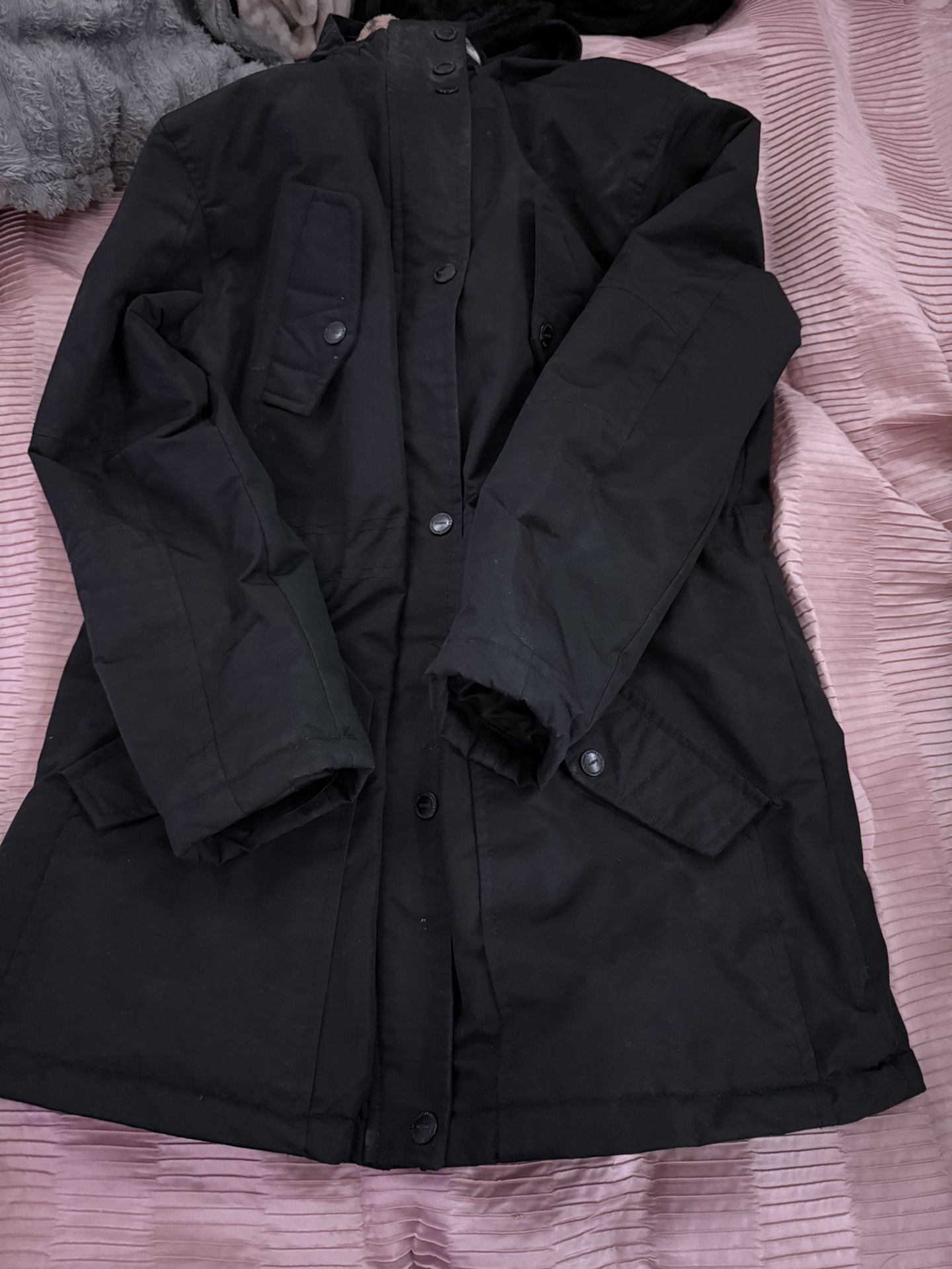 Black jacket with fur lining and hood