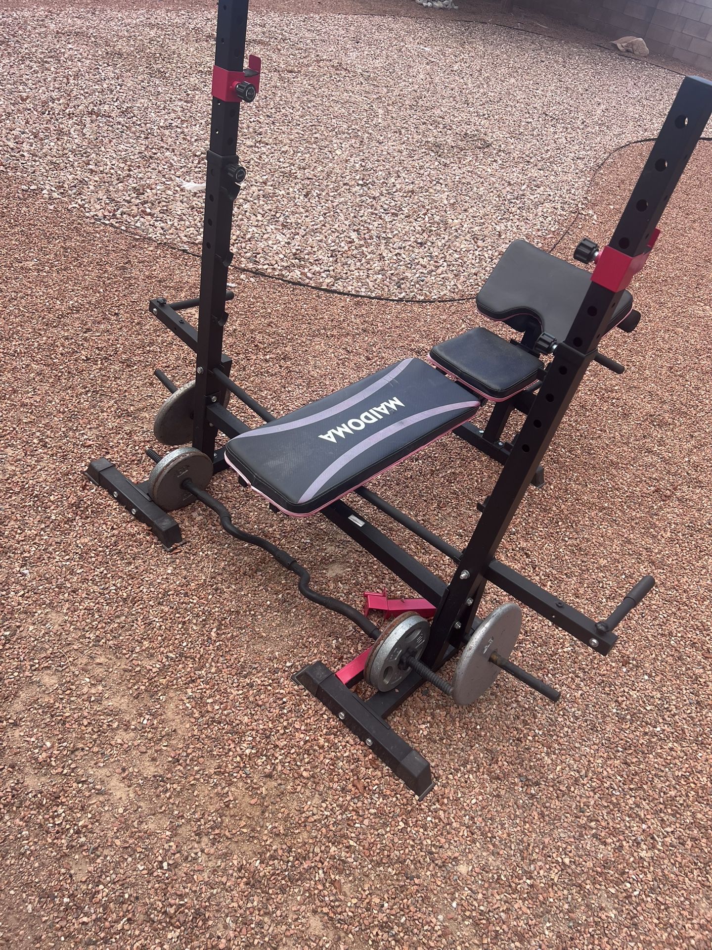 Weight Bench And Weights With Bar
