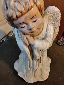 2 ft tall supposed to be outside made for garden angel