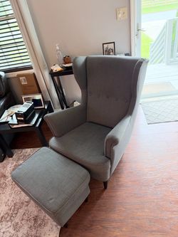 Grey chair and foot rest