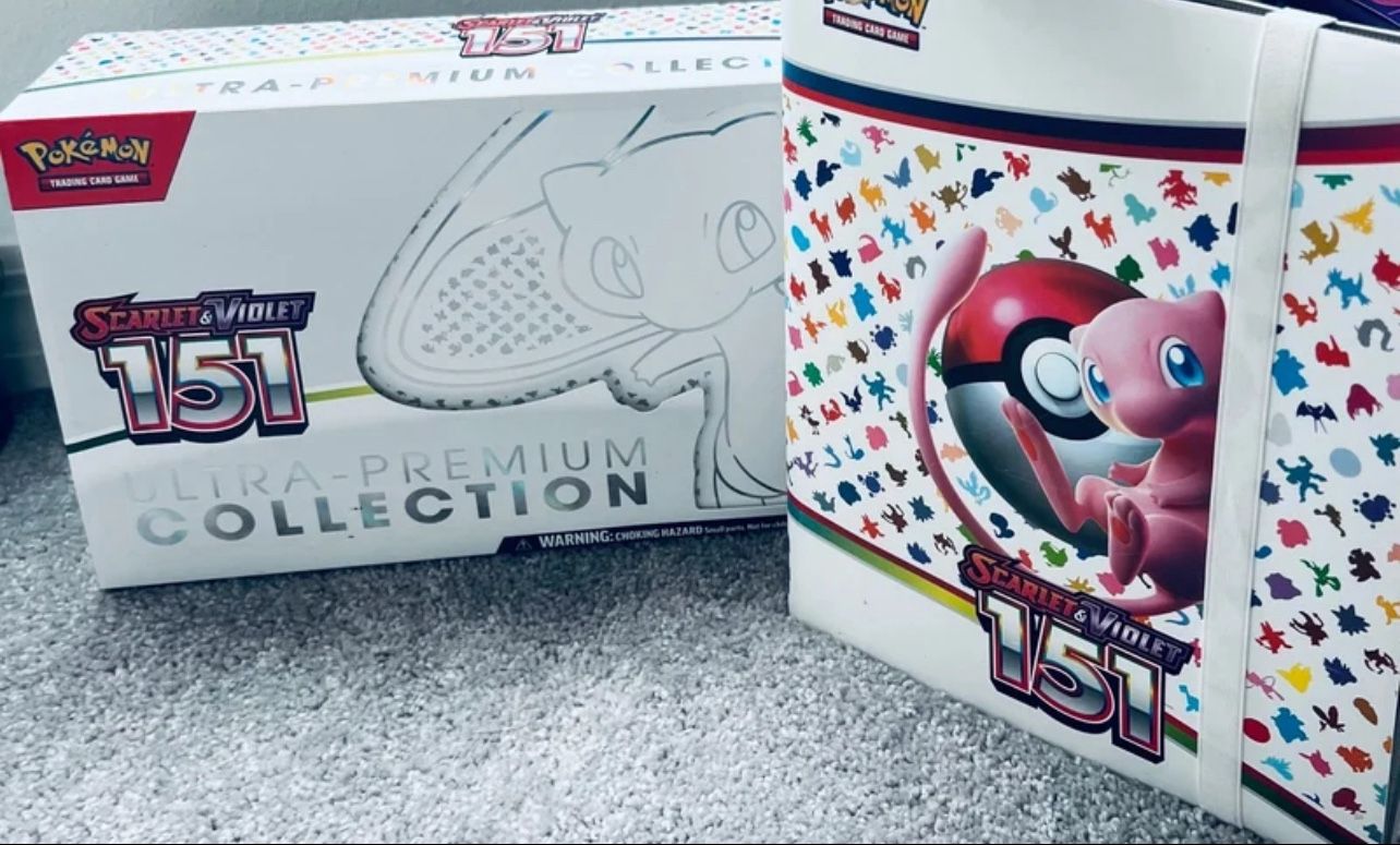 Pokémon Scarlet And Violet 151 Comes With The Book Comes With The Box. There’s A Brand New Mat With Mew On It In The Box.