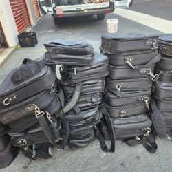 Compact travel bag with smart organization, lightweight design 100 pcs. $800 obo for lot.