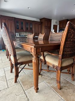 Wood Dining Table with 8 Rattan Chairs