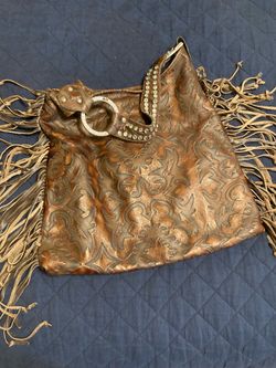 $60 Large leather Raviani fringe bag over$400