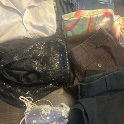 Woman’s large clothing bundle
