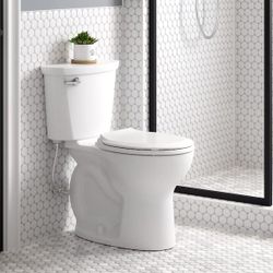 American Standard Cadet toilet box in https://offerup.com/redirect/?o=d2hpdGUuSXQ= features a round front bowl and a chair height of 16.5 inches.