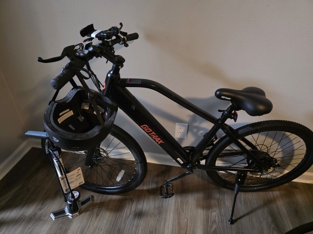 Electric Bike W/ Helmet, Pump, And Phone Holder