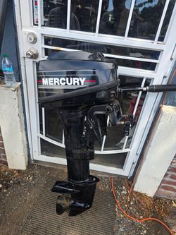 Mercury 8hp outboard.  Like new !