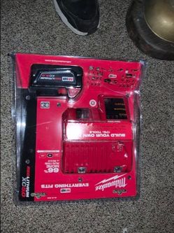 Brand new unopen box 5.0 Milwaukee Battery and charger