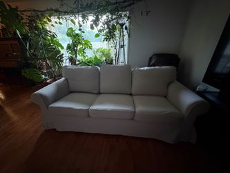 Couch approximately 6 feet white soft cushioning