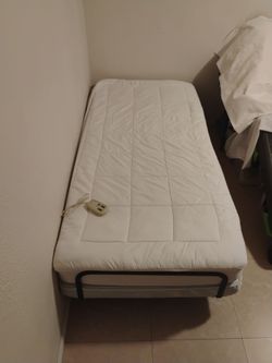 Adjustable Bed with Massage remote control