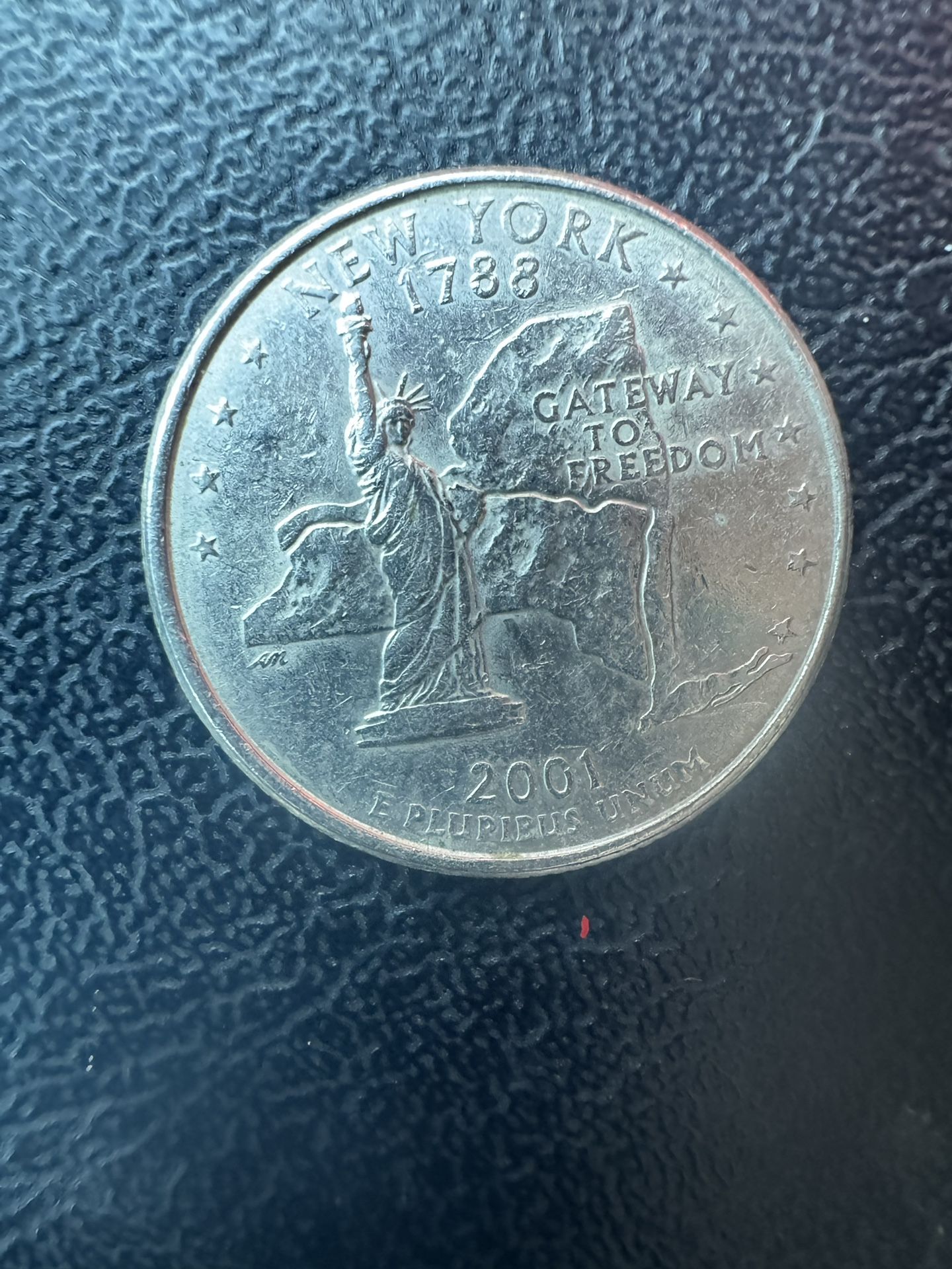 This 2001-P 25C New York State Quarter is a rare find for any coin collector. With a composition of silver and a strike type of business, this coin i