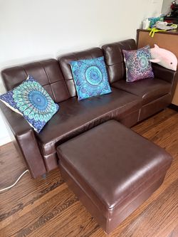 Brown sofa and ottoman