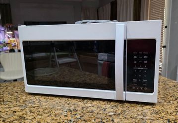 BLACK+DECKER Over the Range Microwave Oven with Vent and One-Touch Auto Cooking, 1.7 cu. ft