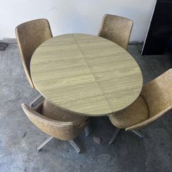 Table With Four Nice Chairs 