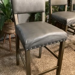 3 Gray Leather Barstools  43.5” Height, 29” Seating For $50