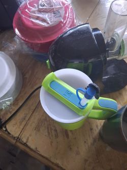 Selling green and blue Stanley