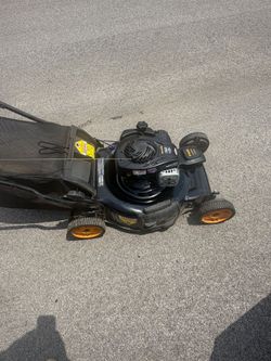 Lawnmower for sale self drive and in great shape comes with bag