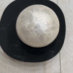 Candle holder with white ball on top